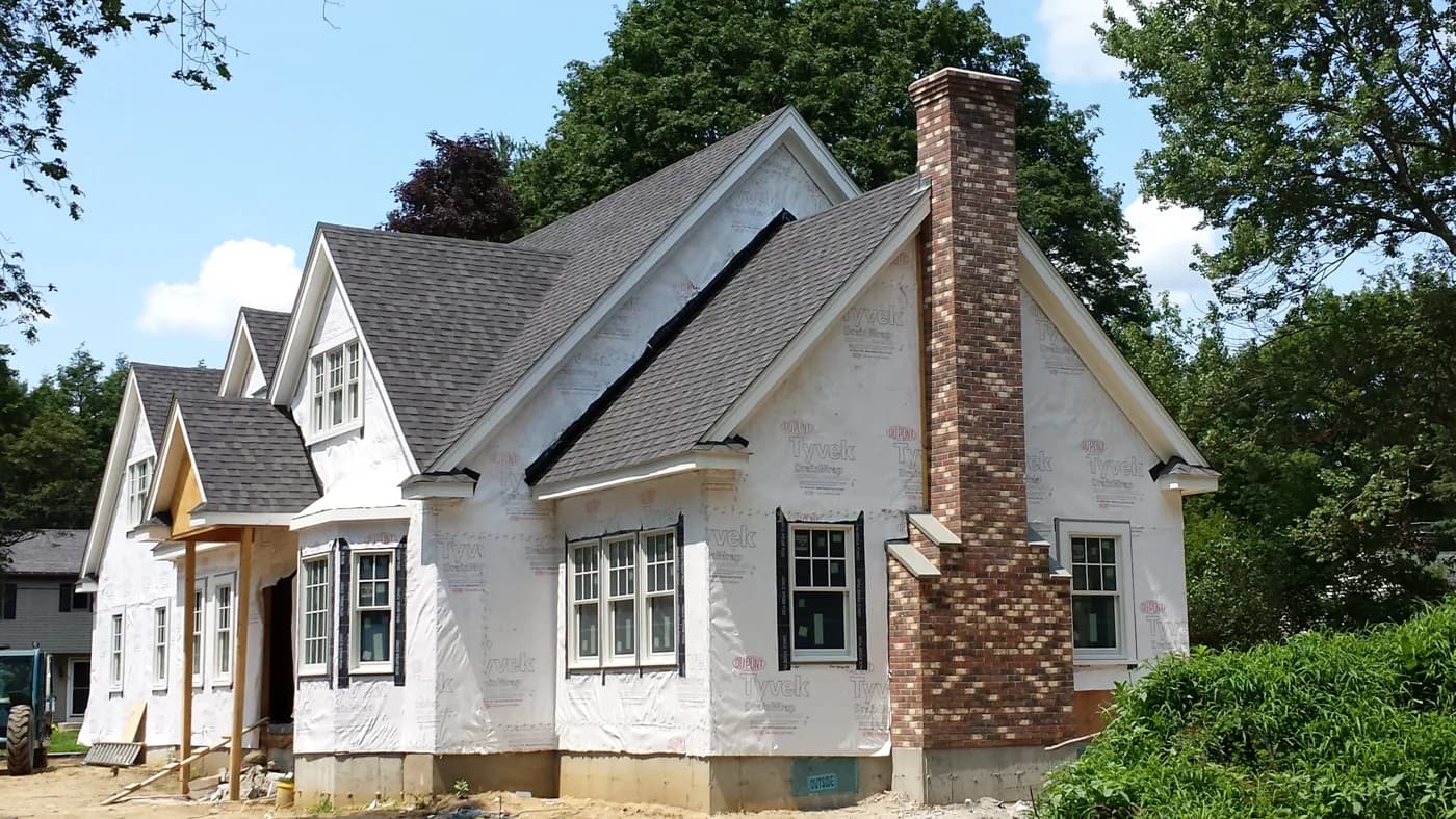 New red brick chimney on a home under construction