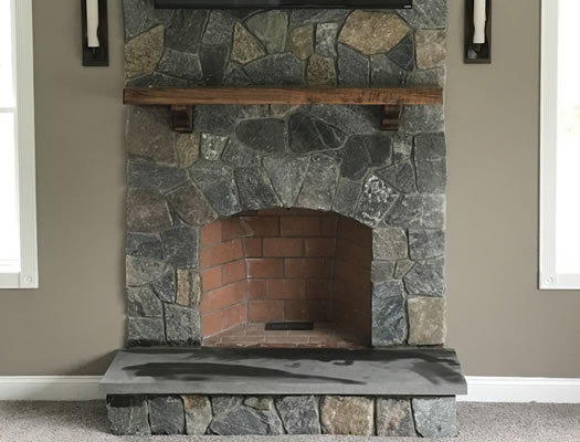 Fireplace makeover with stone veneer