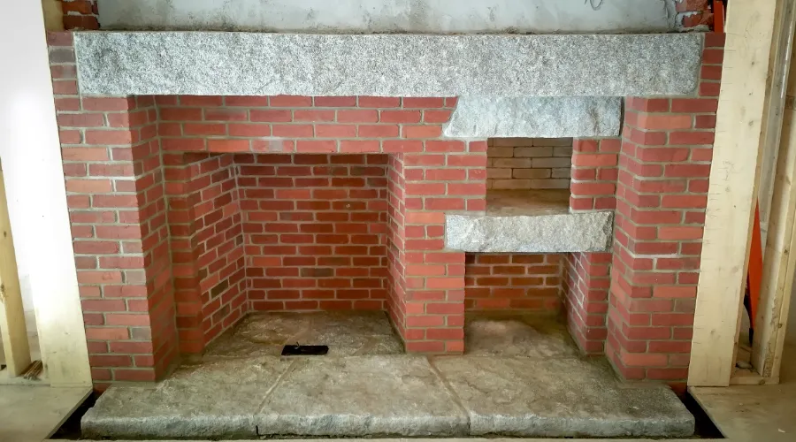 Historic masonry fireplace restoration in Massachusetts