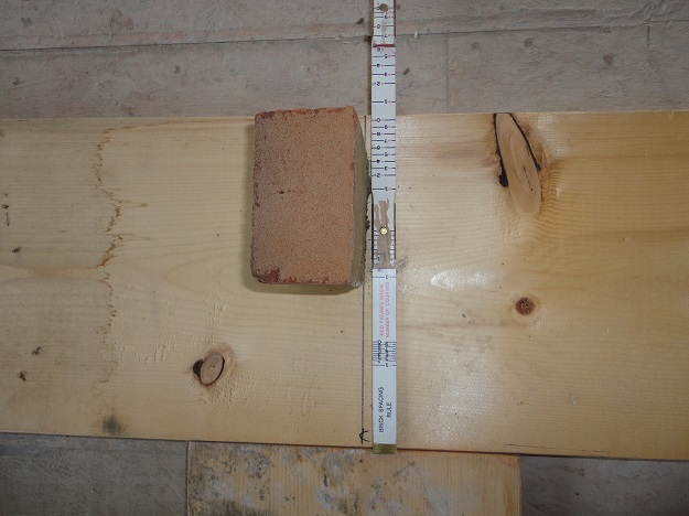 using a brick ruler for masonry spacing