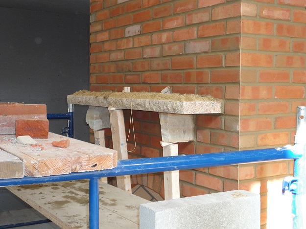 setting a masonry mantle